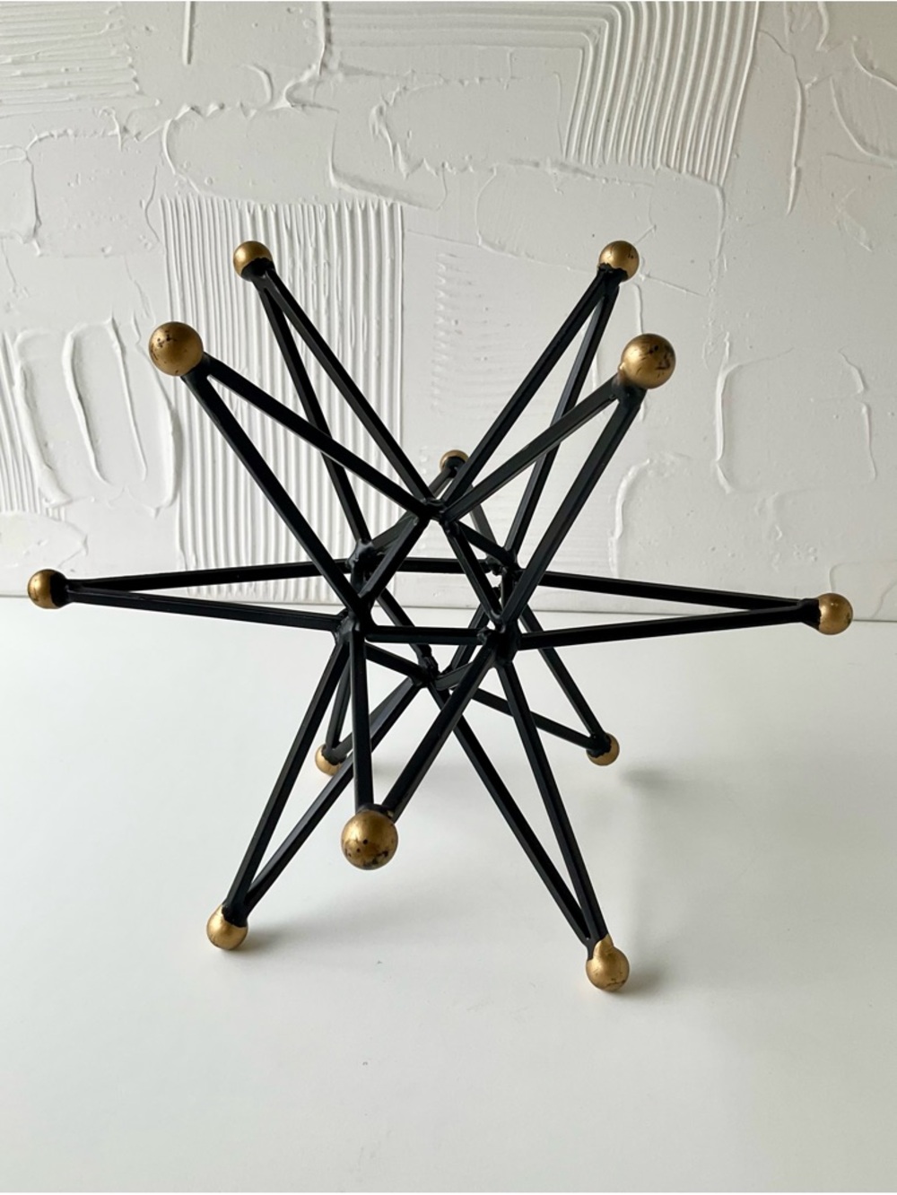Black Metal Starburst Sculpture with Gold Accents